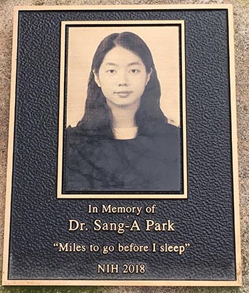 plaque with a photo of Sang-A Park with an inscription