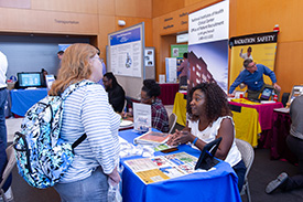 exhibits--people talking at an exhibit table