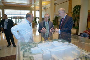 Clinical Center Director John Gallin, U.S. Senator Harry Reed, and NIH Director Francis Collins