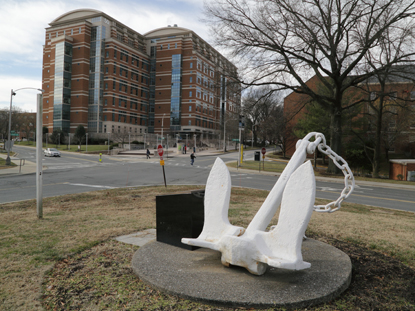 Large white anchor; Building 50 in background