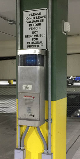 emergency phone on a pillar in a parking garage