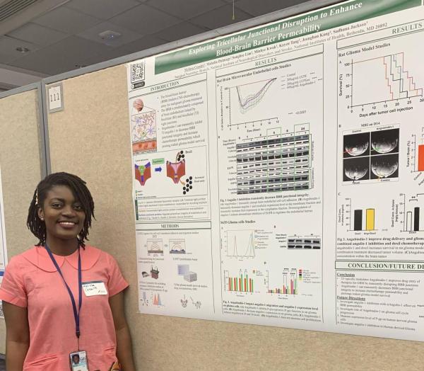 IRP postbac fellow Melissa Cesaire with her poster at Postbac Poster Day
