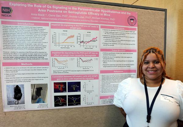 Amia Black poses with her poster at Summer Poster Day