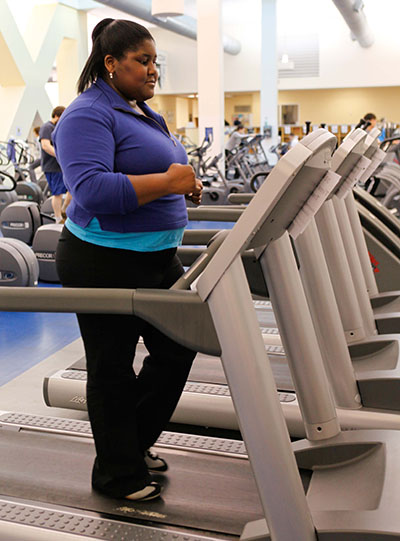 women exercising on treadmill