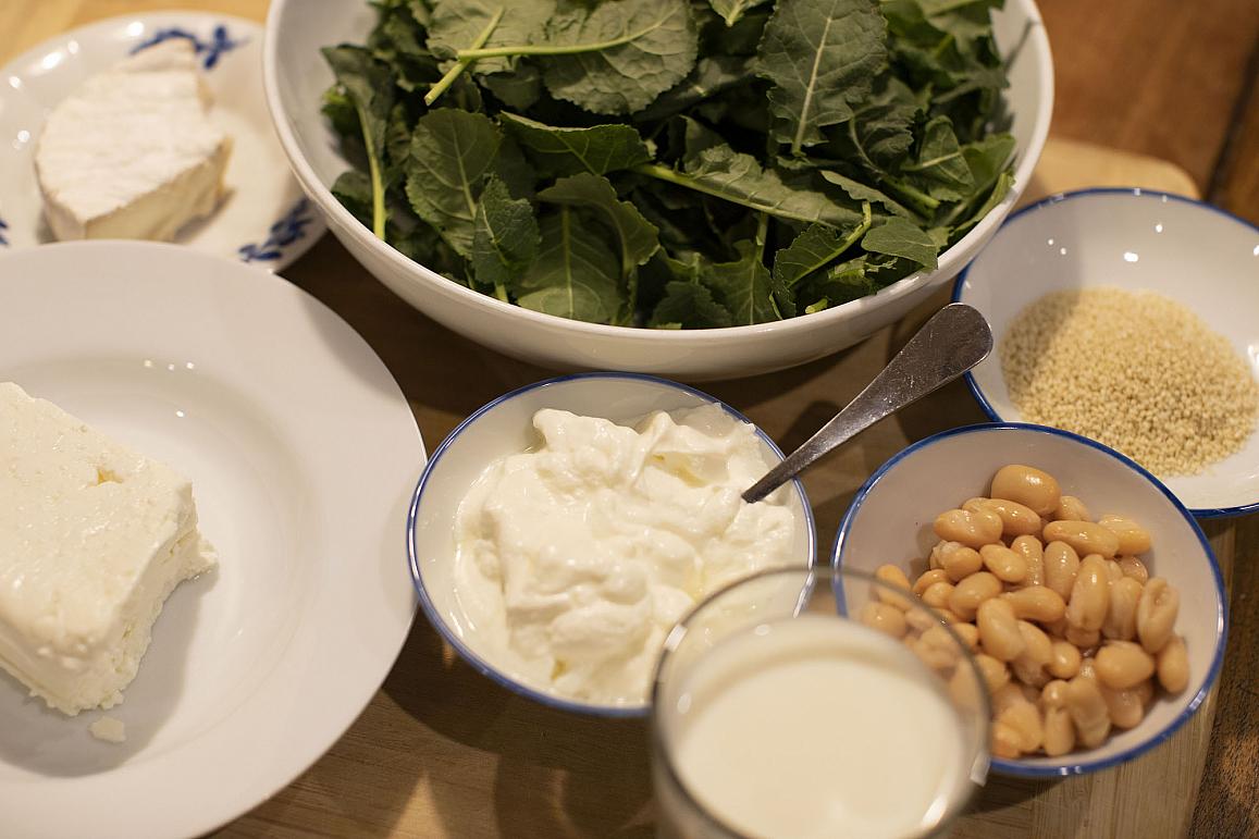 an assortment of calcium-rich foods, including milk, yogurt and cheese, as well as non-dairy sources such as kale, white beans and sesame seeds