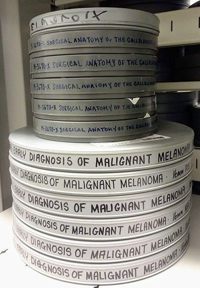 stack of metal film containers