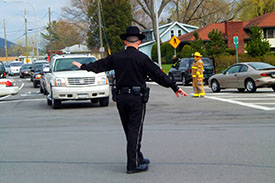 traffic cop stopping traffic