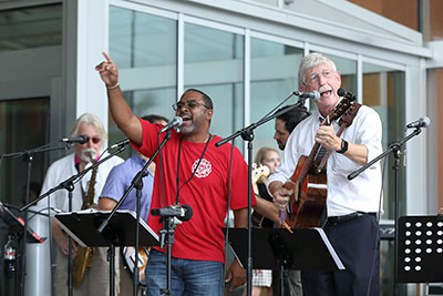 NIH Director Francis Collins (on the right) and other band members playing