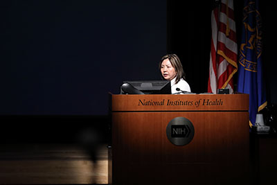 Elizabeth Kang at the podium