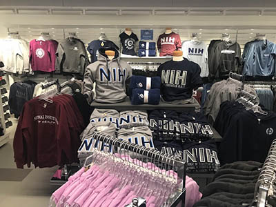 inside of shop showing clothing on the shelves