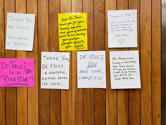 seven handwritten notes posted on a wall