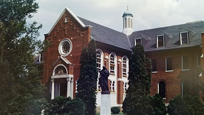 exterior of the brick Cloister building in the 1950s