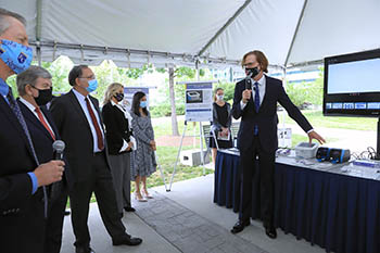 Bruce Tromberg talking to senators