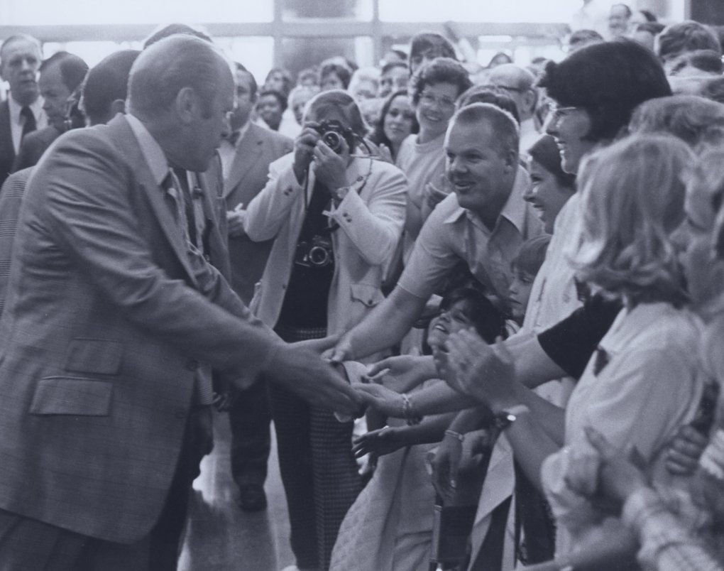 President Gerald Ford greeting people at NIH