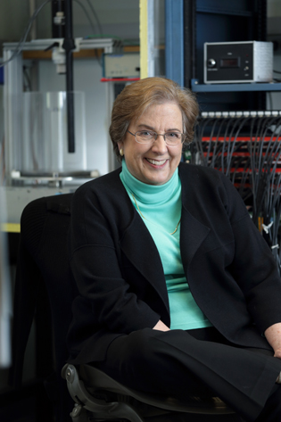 Judie Walters sitting in her lab