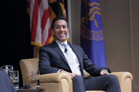 Sanjay Gupta sitting in an armchair