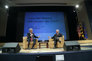 FRANCIS COLLINS (LEFT) AND SENATOR BEN CARDIN ON STAGE