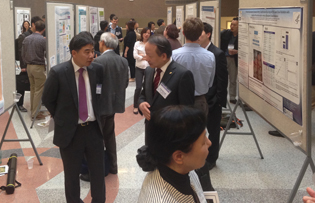 Scientists at a poster session