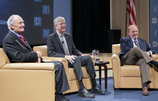 Alan Alda, Francis Collins, and Roger Rosenblatt sitting in chairs on stage