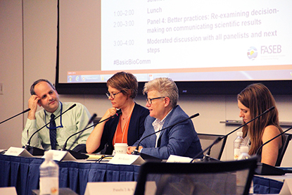  Four people at a table with microphones