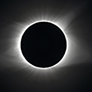 TOTAL SOLAR ECLIPSE; SUN IS BLACK CIRCLE WITH LIGHT EMANATING FROM ALL SIDES