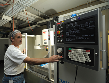 man working at a machine