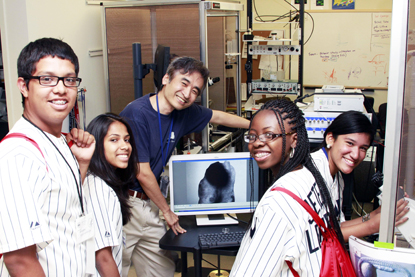  left to right, male student, female student, male NIH investigator, female student