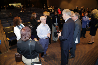  Francis Collins talking to a group op people