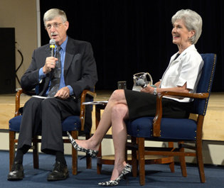 Francis Collins and Kathleen Sebelius sitting on stage