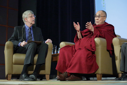 FRANCIS COLLINS AND THE DALAI LAMA SITTING ON STAGE