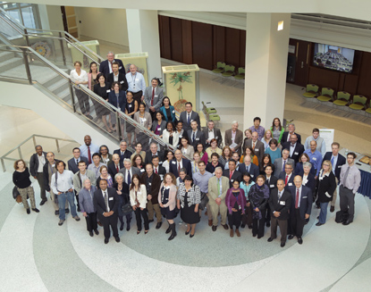 large group of people standing on stairwell in Building 35