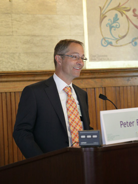  Peter Fisk at a podium