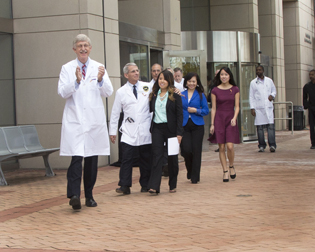 several people walking out of the Clinical Center