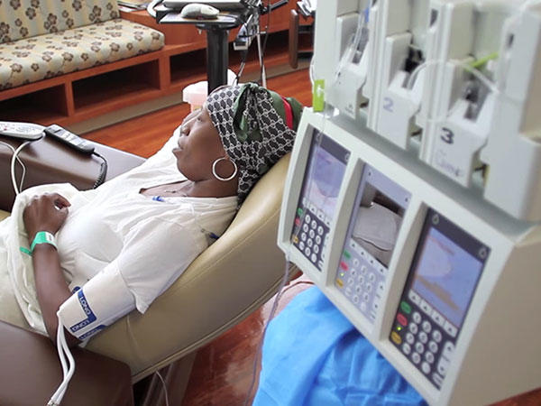 woman receiving chemotherapy treatment