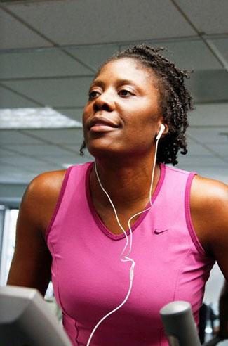 woman exercising on treadmill
