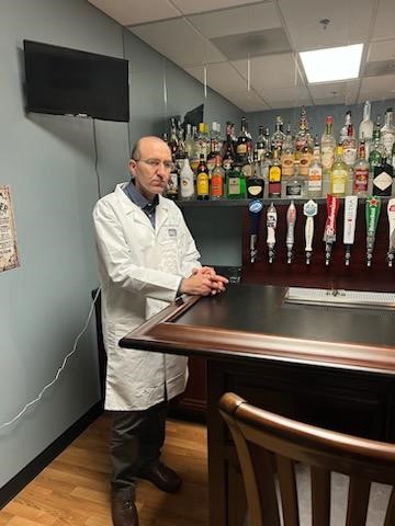 Simulated bar with Lorenzo Leggio standing on the left