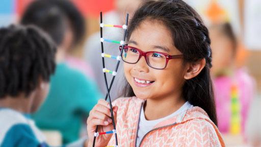 girl holding DNA molecule