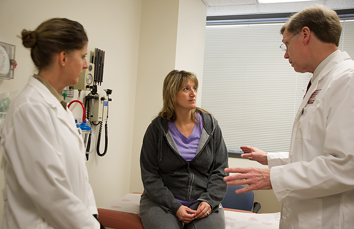 Dr. Linehan talks with a VHL patient