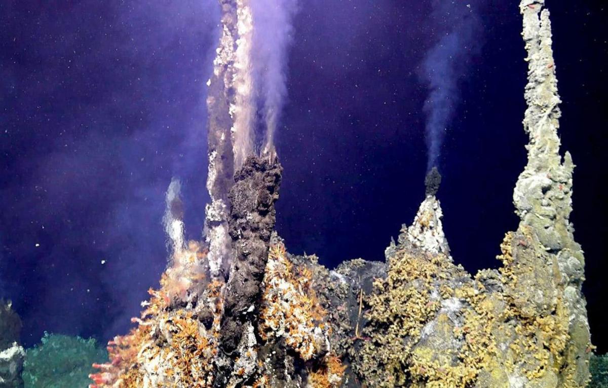 towering undersea columns with steam rising from tops