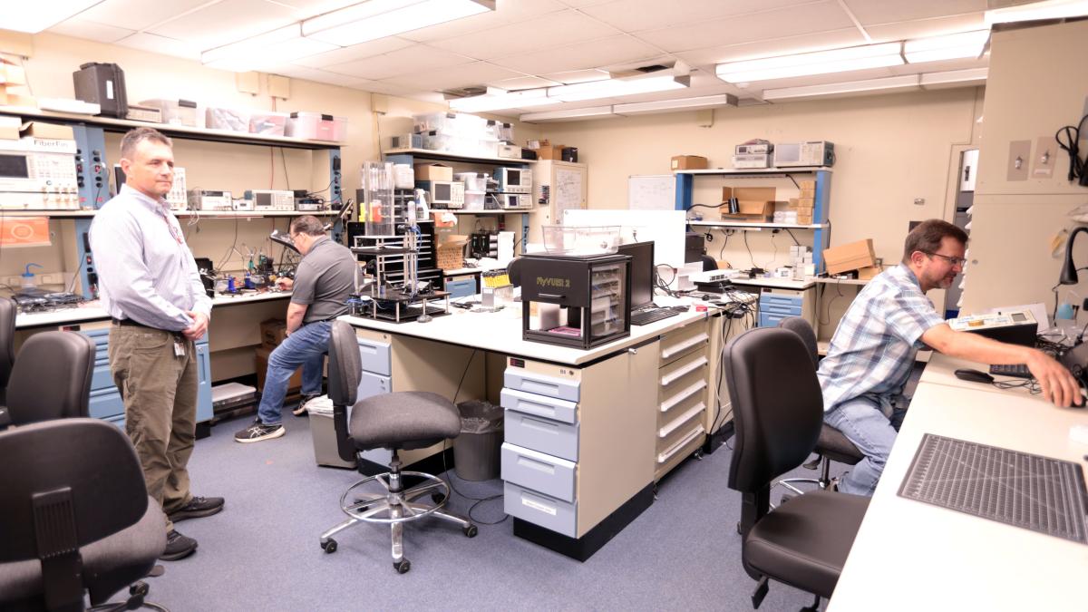 IDEAS Lab staff Tom Pohida, John Kakareka, and Randy Pursley working in the lab