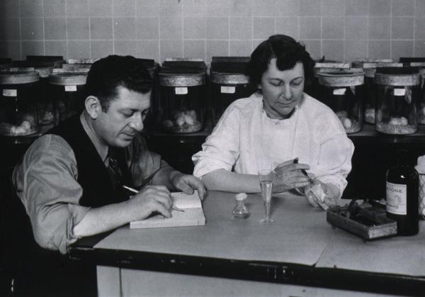 Sara Branham (right) and her technician Robert Forkish in their NIH lab