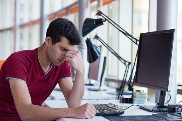 man in pain from a headache