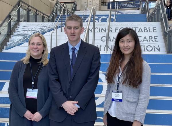 Dr. Hourigan (middle) with two members of his team — Staff Scientist Laura Dillon (left) and statistician Gege Gui (right) — at the 2022 meeting of the American Society of Clinical Oncology (ASCO)