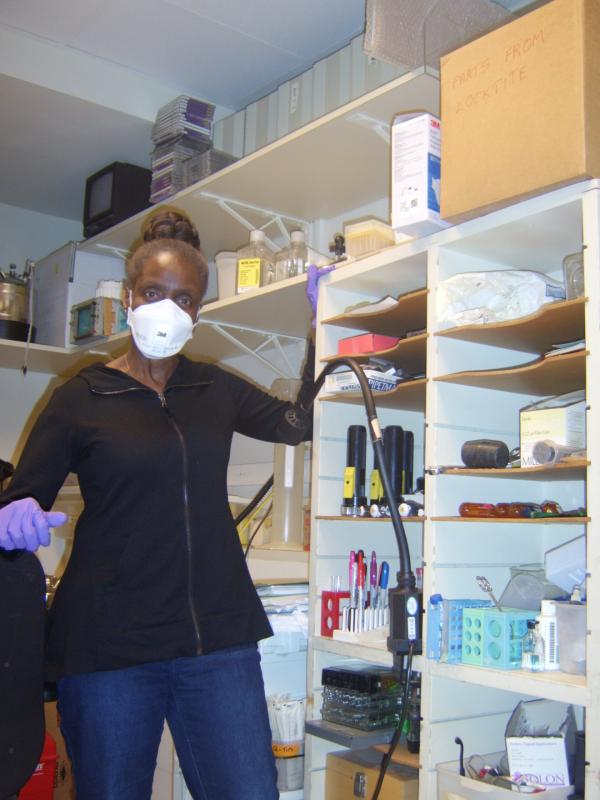 woman wearing face mask in a lab