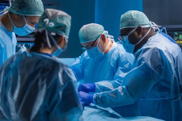 surgeons performing surgery
