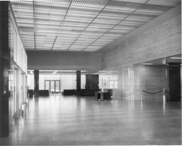 Black and white image of NIH Clinical Center marble-walled lobby