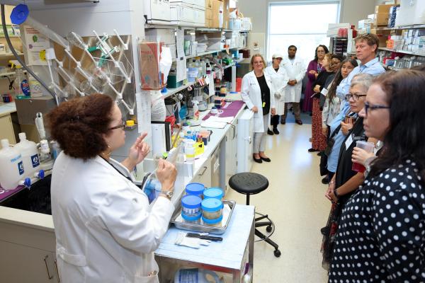 Tiffany Powell-Wiley speaks to tribal leaders at her lab