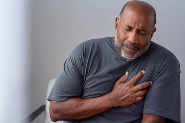 black man having chest pains