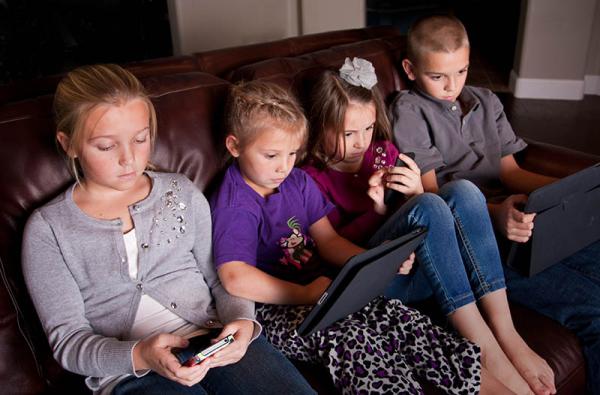 kids using phones and tablets