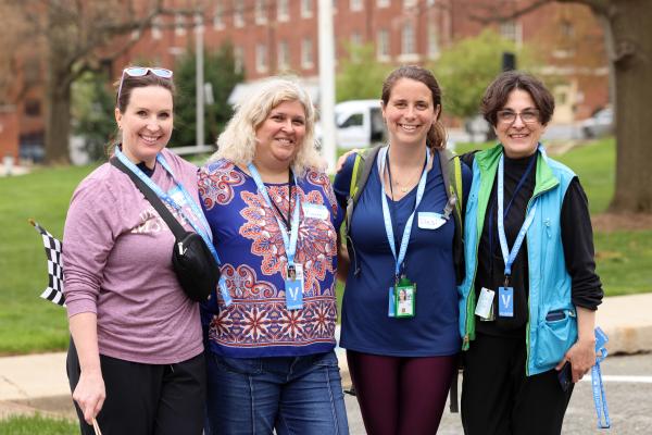 four women volunteering at the NIMH 5K event